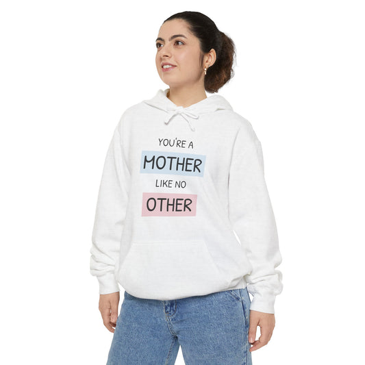 Person wearing a white hoodie with text on a white background