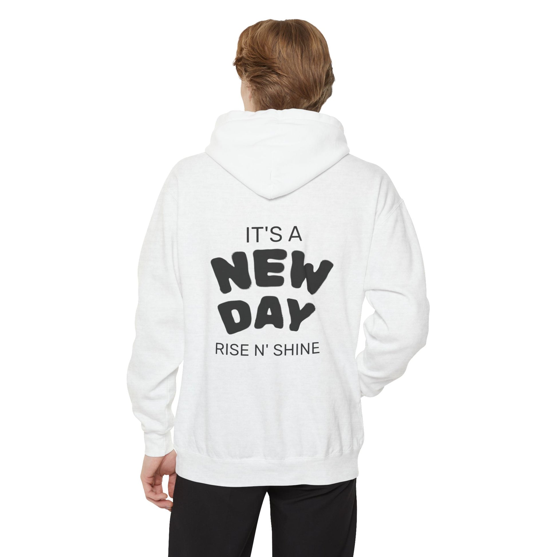 Person wearing a white hoodie with text on the back, standing against a white background