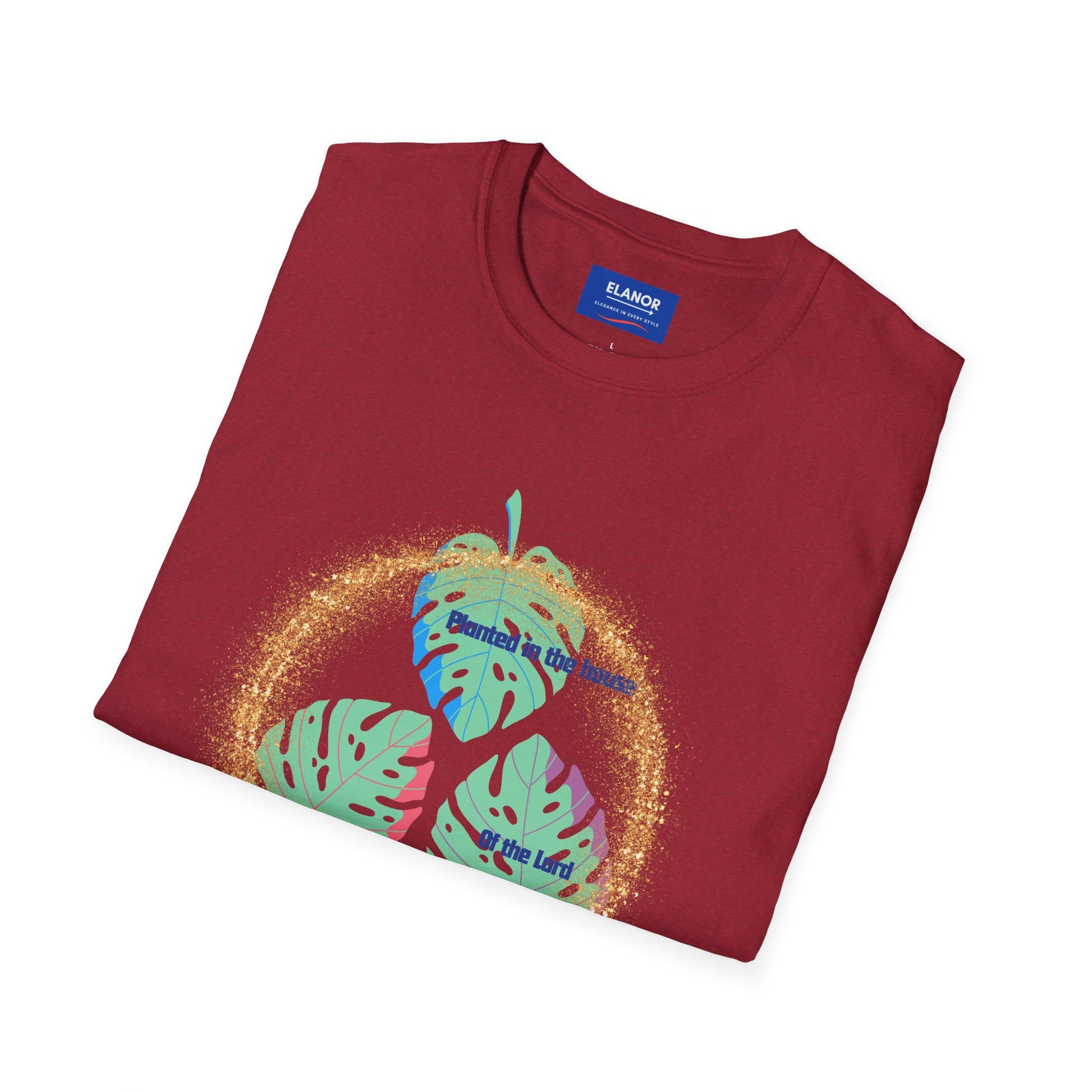 Folded red t-shirt with colorful design and 'Emanuel' branding on a white background