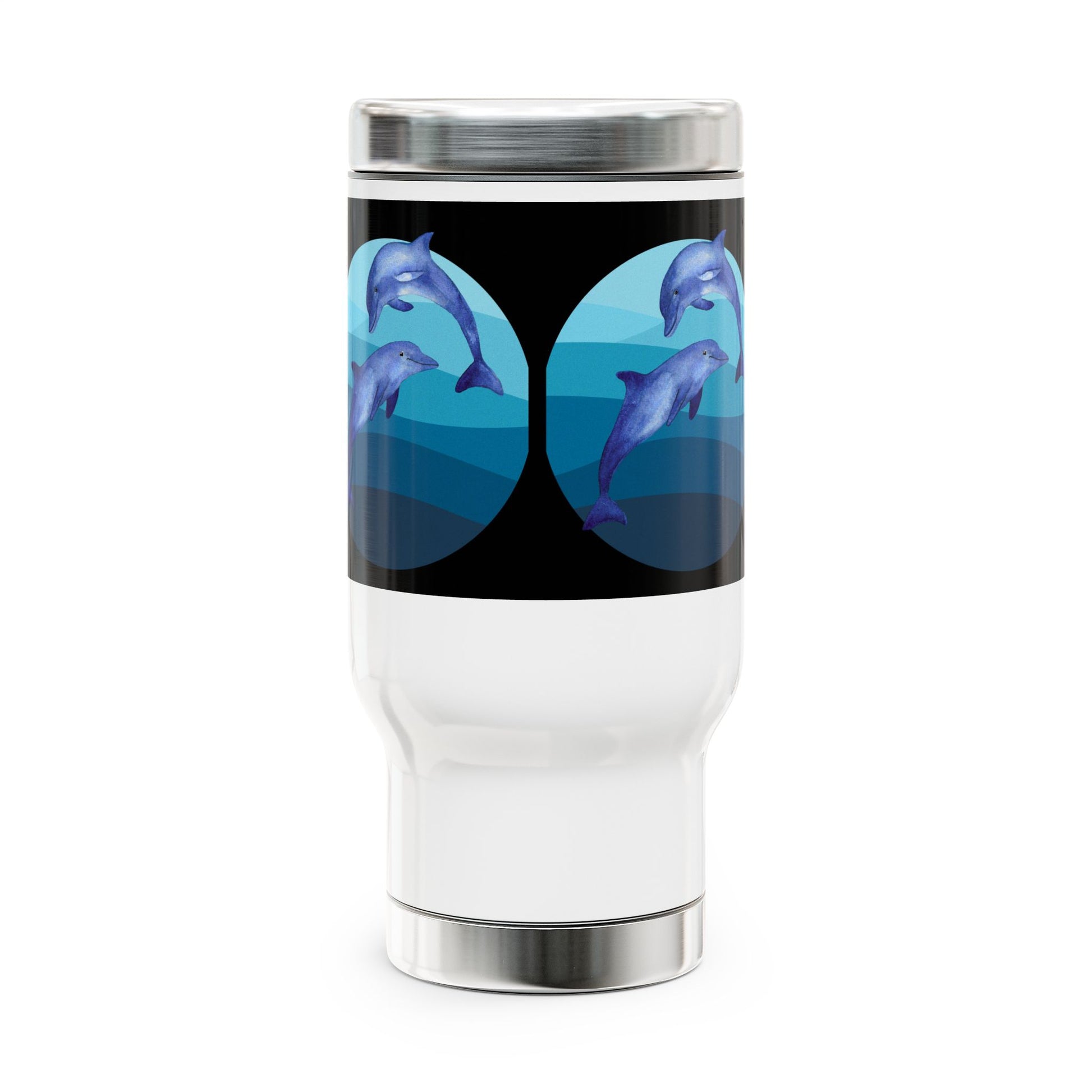 White tumbler with dolphin design on a black background