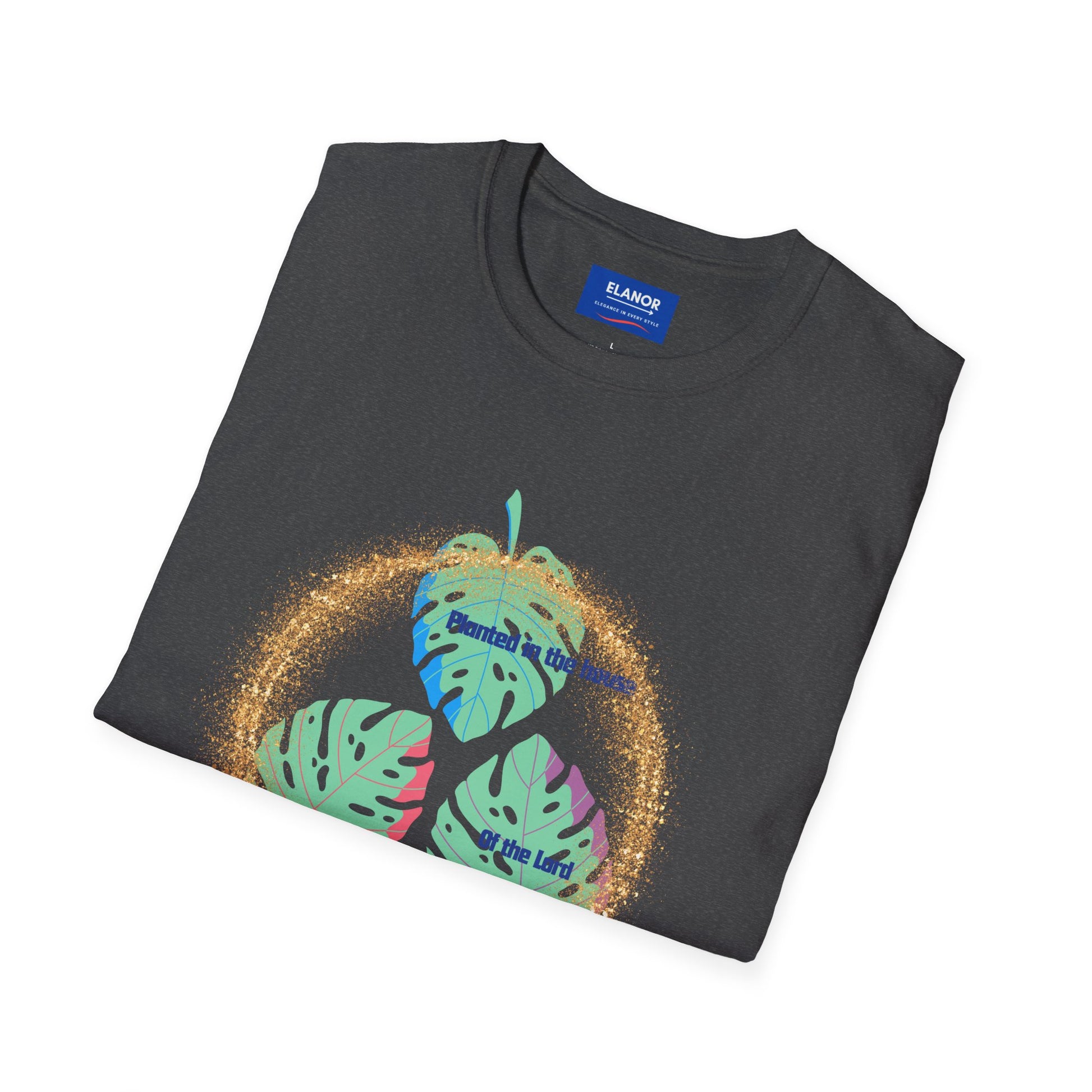 Folded black t-shirt with colorful graphic design on a white background