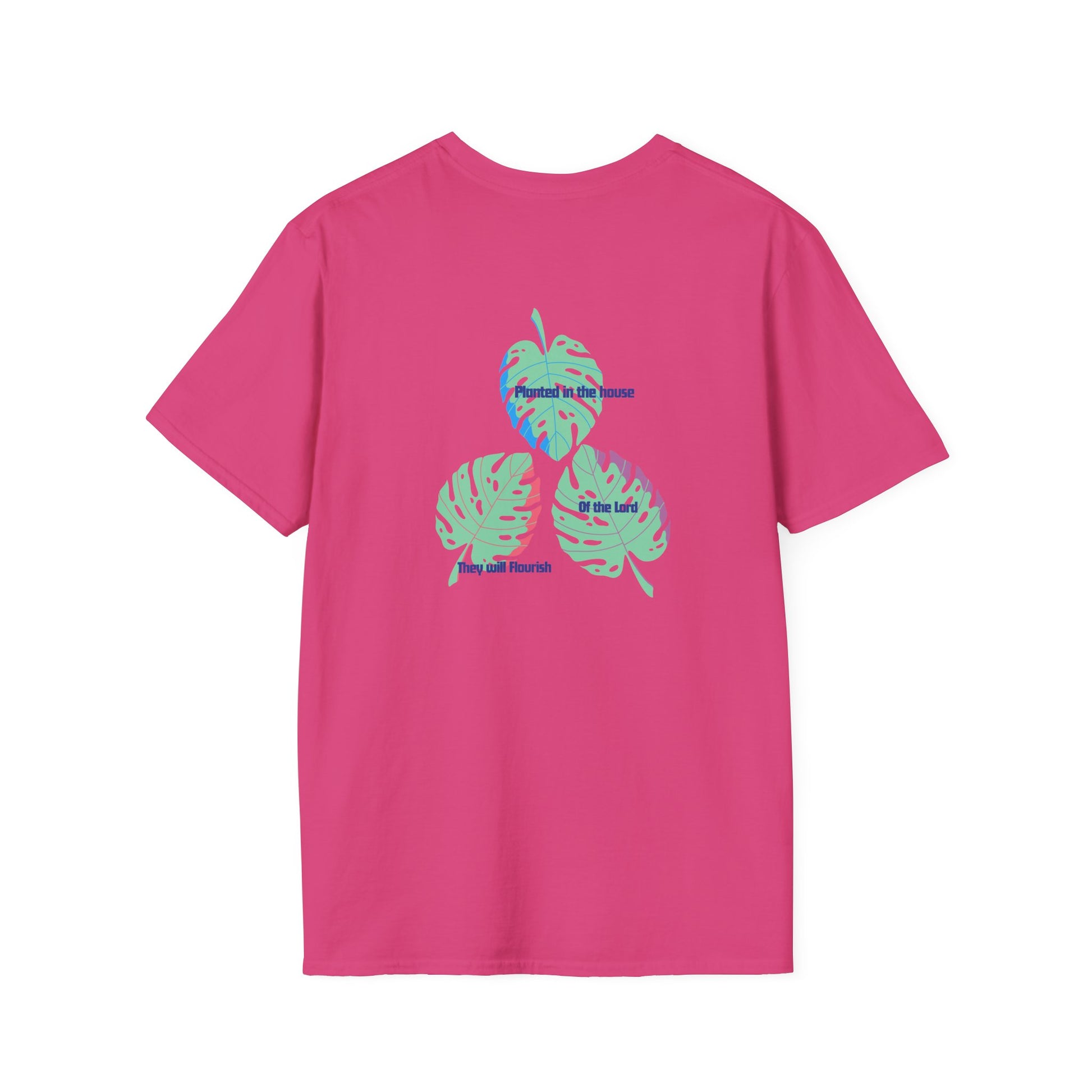 Pink t-shirt with tropical leaf design on the back against a white background