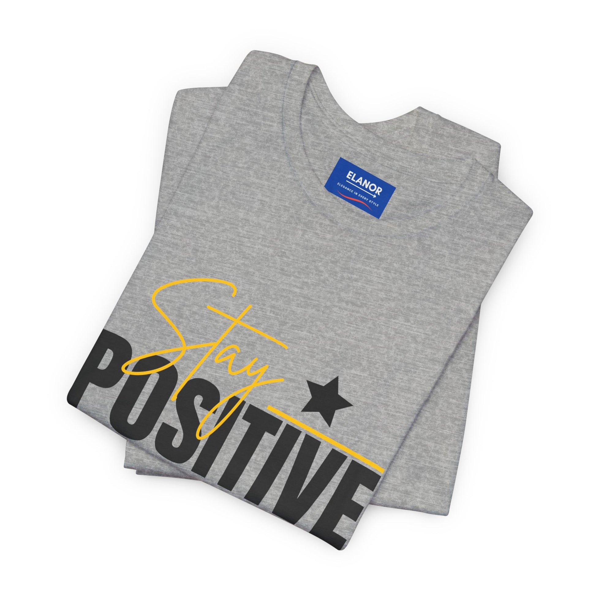 Gray t-shirt with 'Stay Positive' text on a white background
