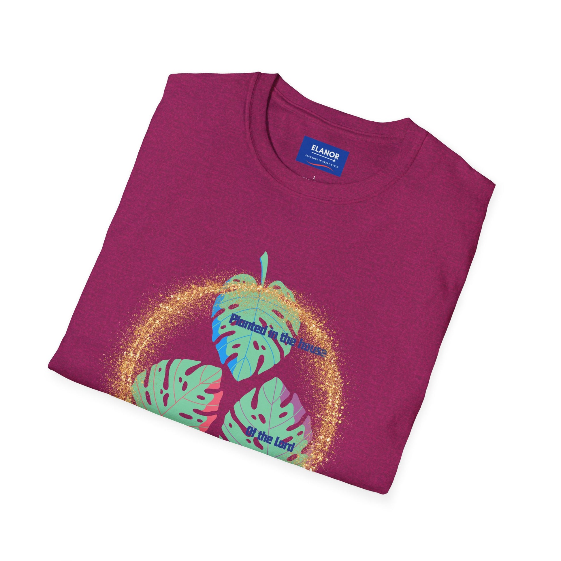 Folded purple t-shirt with a colorful design and 'Elanor' branding on a white background