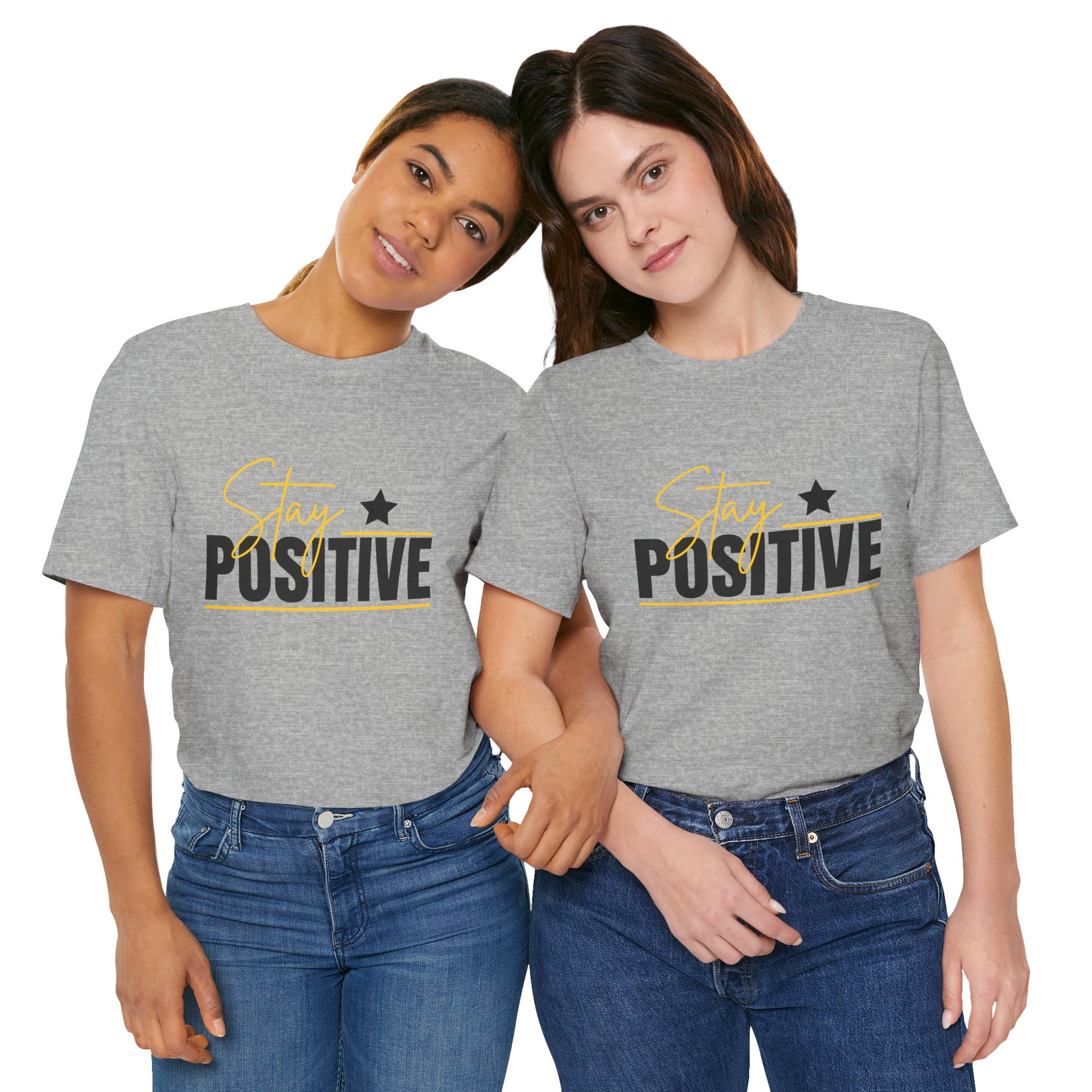 Two people wearing gray t-shirts with 'Stay Positive' text on a white background