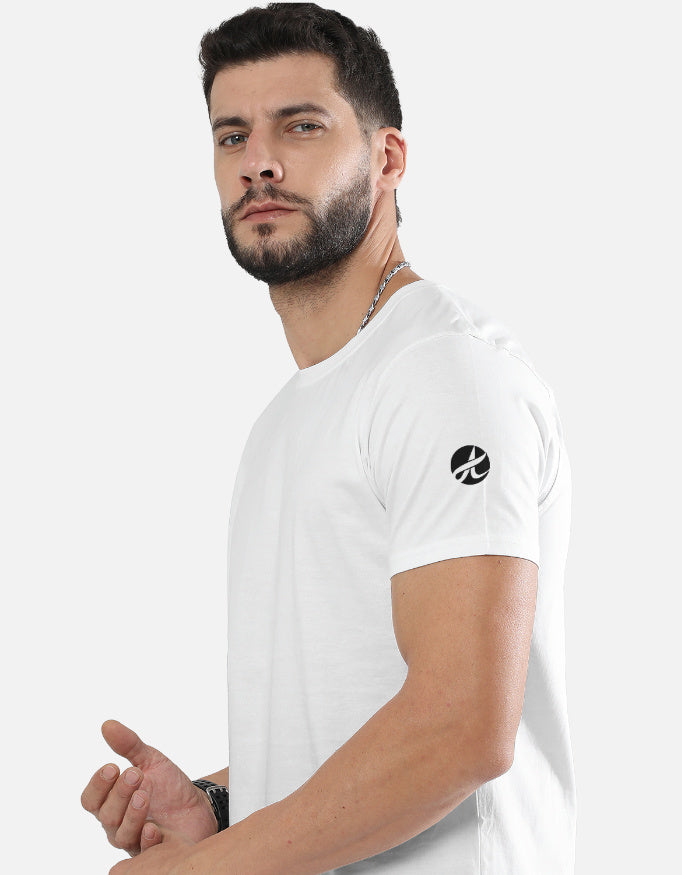 Man wearing a white t-shirt with a logo on a white background