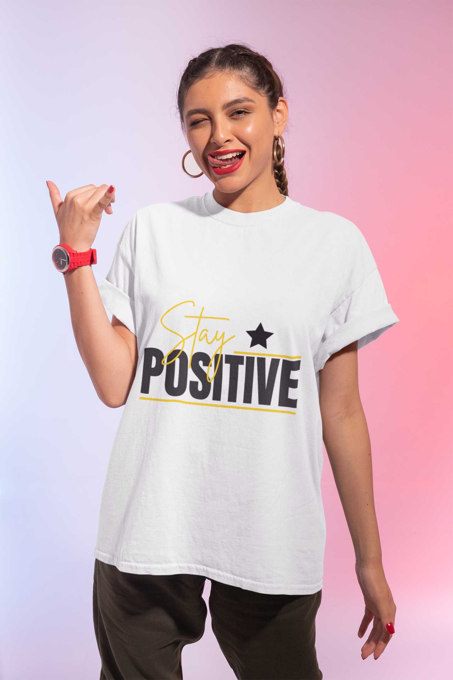 Woman wearing a white t-shirt with 'Stay Positive' text on a gradient background