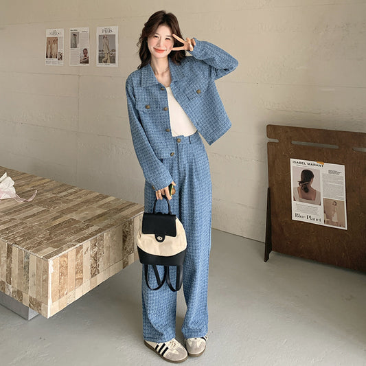 Person wearing a blue outfit in a casual setting