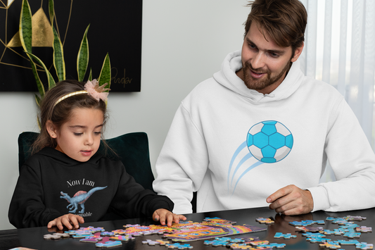 Man and child playing with a puzzle together