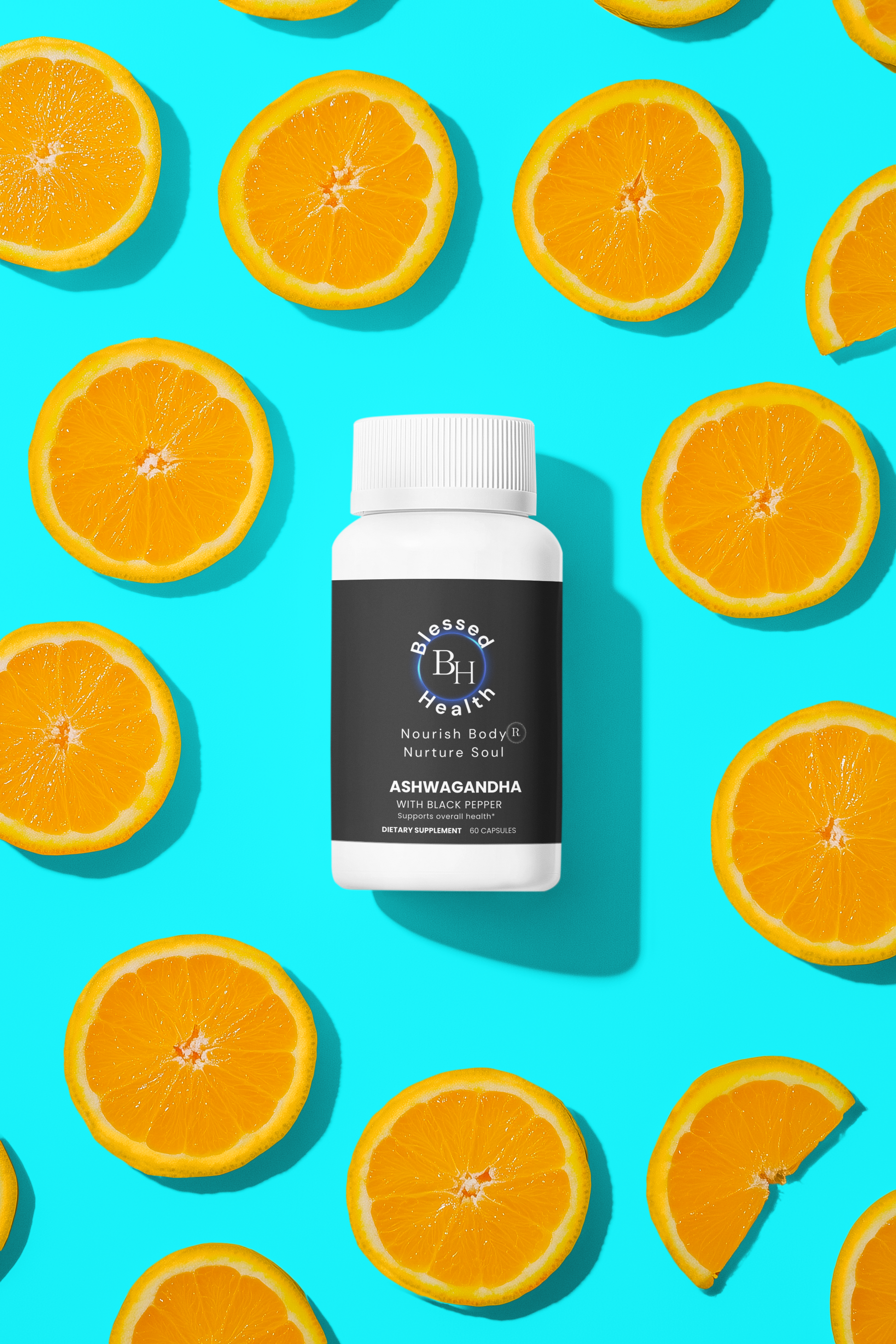 Supplement bottle labeled 'Ashwagandha' on a blue background with orange slices.