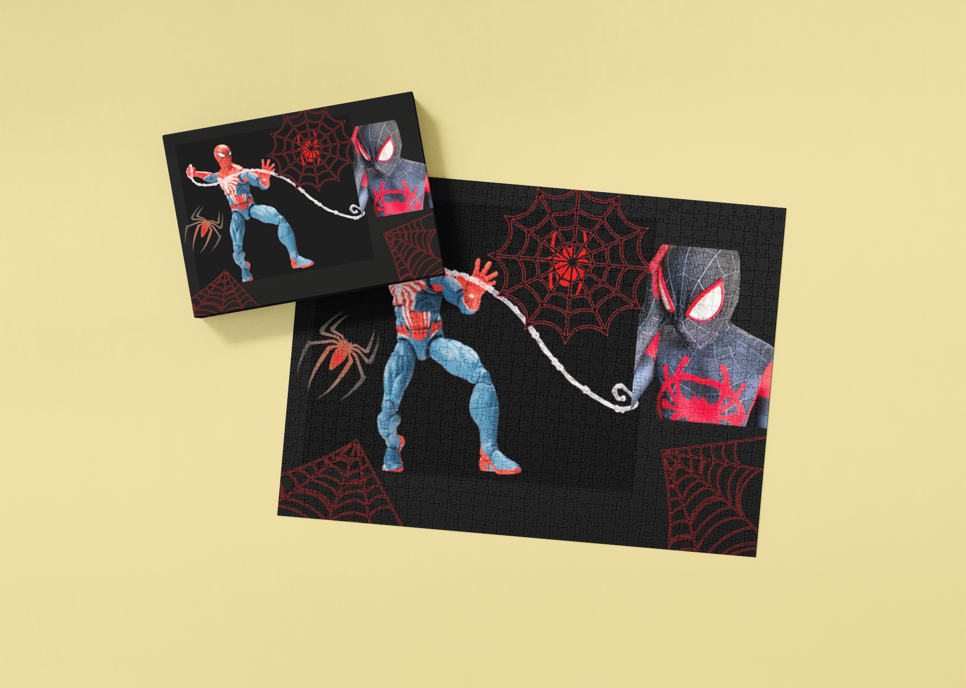 Two black cards with Spider-Man illustrations on a beige background