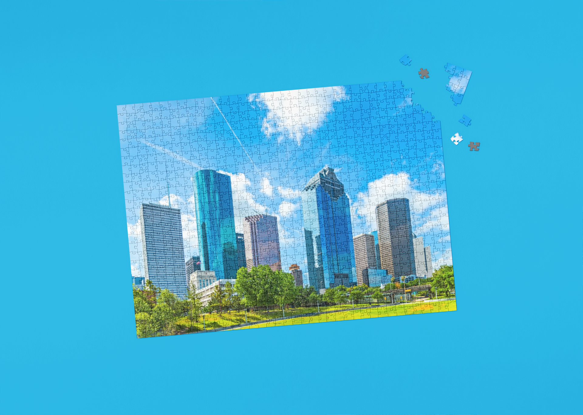 Puzzle with a completed cityscape on a blue background
